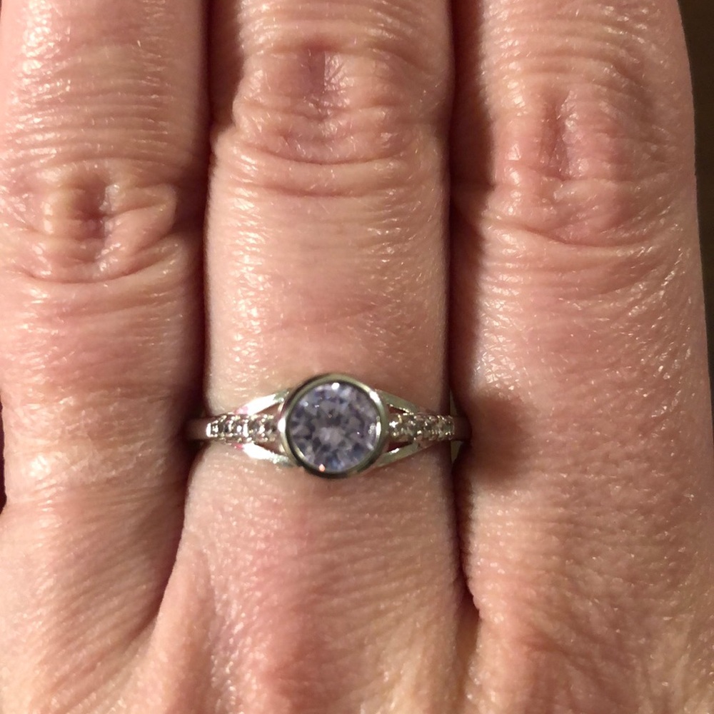 Size 9 ring with light purple stone